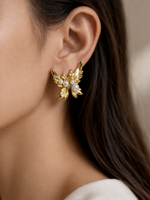 stainless steel gold plated wing pearl earrings