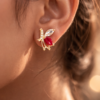 ruby glow stainless steel gold plated stud earrings