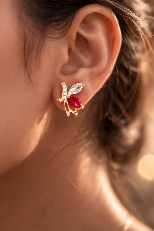 ruby glow stainless steel gold plated stud earrings