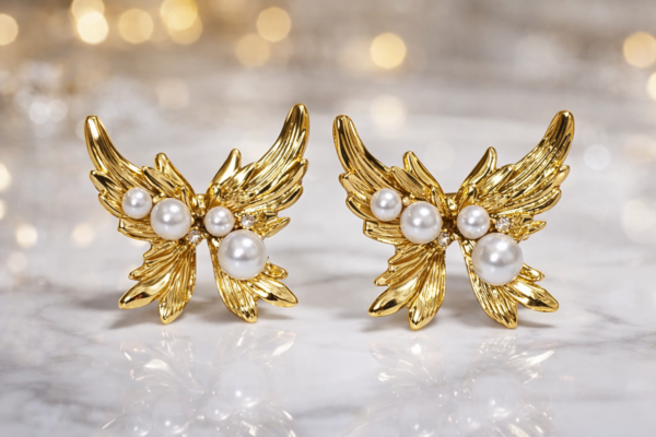 stainless steel gold plated wing pearl earrings